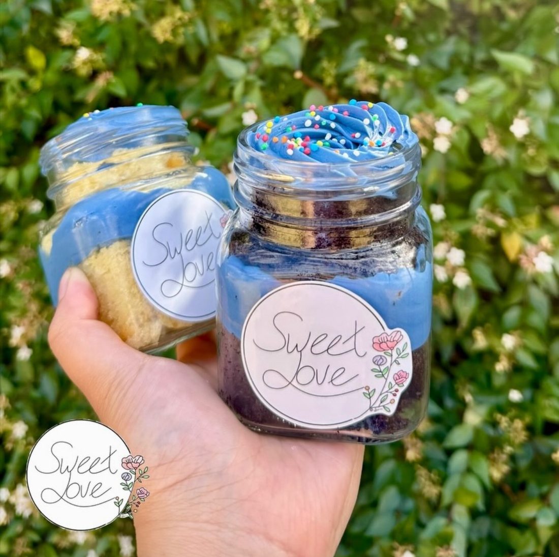 Blue sponge cake jars with sprinkles in reusable glass jars